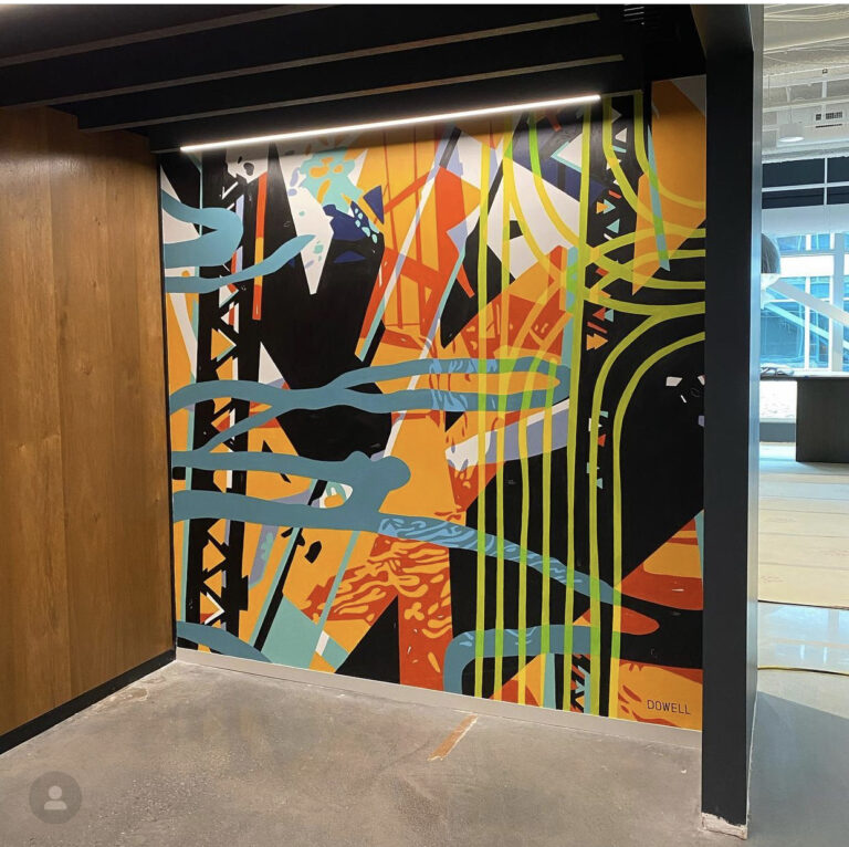 These two lobby murals for EY’s Rail Trail South End location incorporate themes of innovation, connection, the coexistence of man and nature and growth through nods to train tracks, abstracted tree bark, trusses and vibrant color.