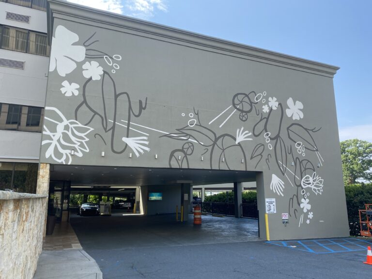 This Fairfield Marriott Uptown Charlotte mural showcases native flora, creating a warm, welcoming garage entrance for guests, visitors, and staff alike.