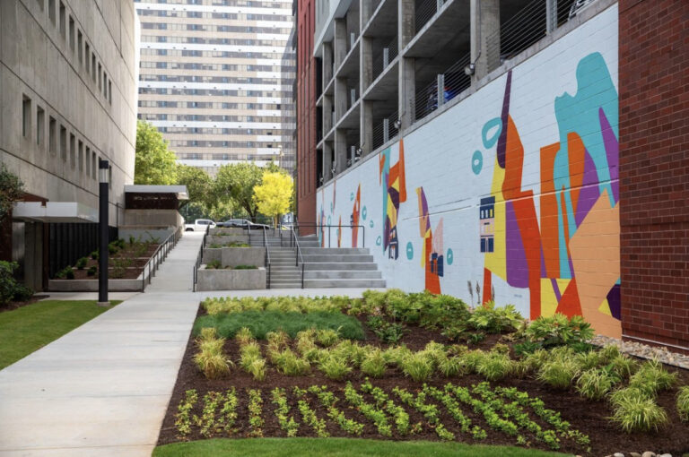 Commissioned by CRG for The Standard in Columbia, SC, these murals honor the historic Black Wall Street that once stood where The Standard and Richland Library sit.