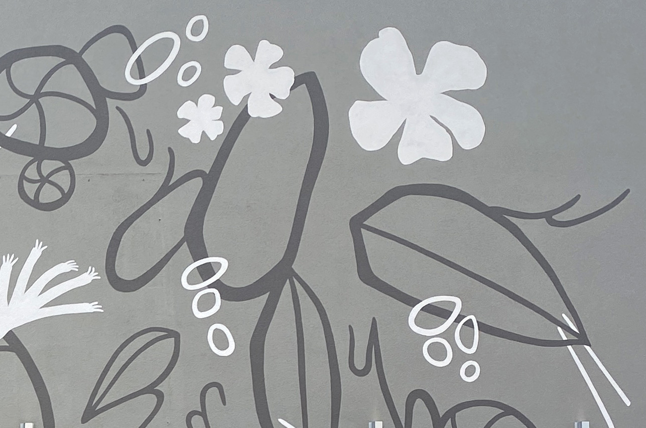 This Fairfield Marriott Uptown Charlotte mural showcases native flora, creating a warm, welcoming garage entrance for guests, visitors, and staff alike.